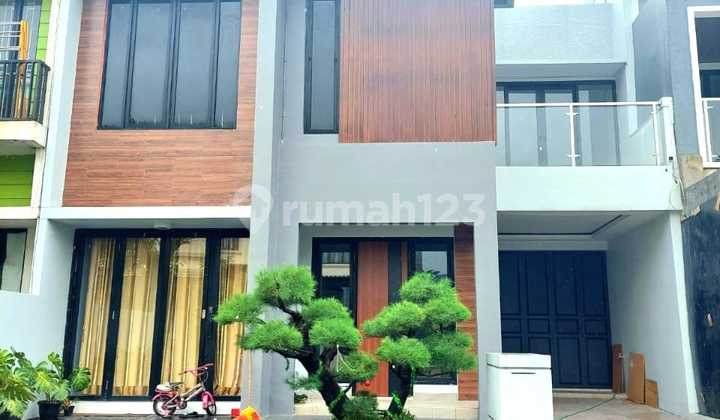 Rumah Lokasi Strategis Sudah Renovasi Siap Huni di Graha Raya