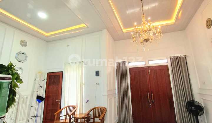 Rumah Minimalis 2 Lantai Lokasi di Graha Raya 2