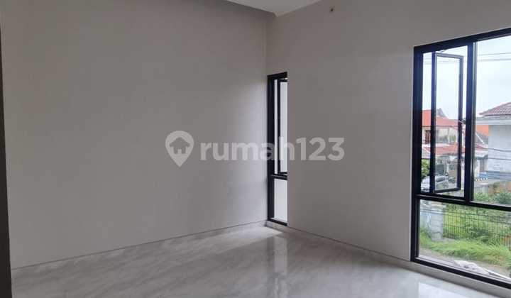 DIJUAL RUMAH NEW MINIMALIS DI KLAMPIS ROW JALAN 4 MOBIL 2