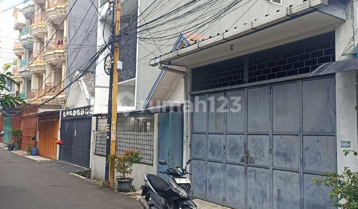 Rumah Lebar 12 Meter Murah