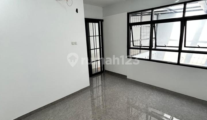 For sale 2-story house in Cluster Harmoni, Harapan Indah, Bekasi 2