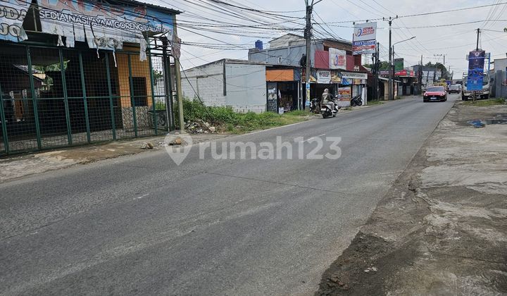 Tanah Samping Jalan Raya Mustika Jaya dengan Lebar Muka 11 Meter Cocok untuk Pergudangan Ataupun Usaha Lainya