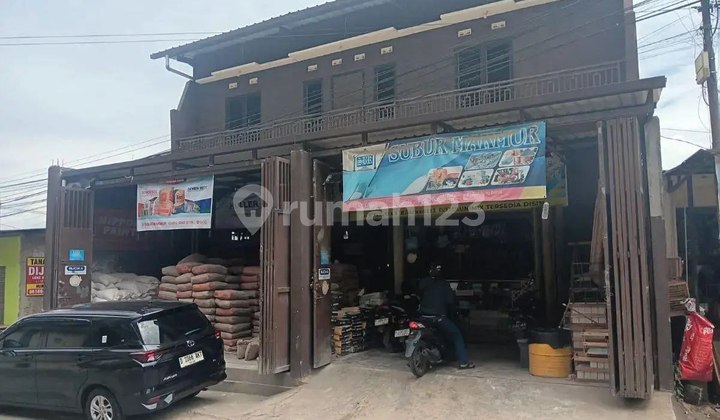 Strategic Shop Auction in New Parahyangan City