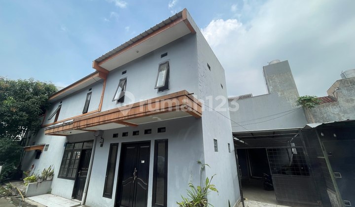 Lelang Rumah 2 Lantai Halaman Luas di Pusat Bandung 2