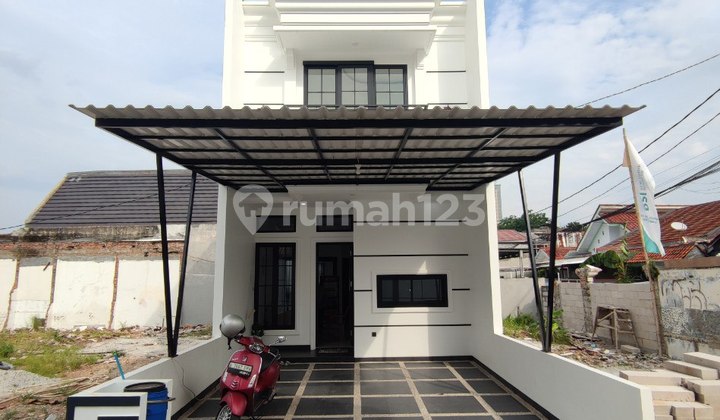 Dijual Rumah Free All Biaya Dekat Palem Kartika & Tol Bambu Apus Jaktim Lokasi Bebas Banjir dan Akses Jalan 2 Mobil One Gate System dan Security 24 Jam Bonus 2 Pembeli Pertama Free BPHTB, AJB, Bn, Kanopi, AC + Diskon Harga Puluhan Juta Lokasi Strategis : 