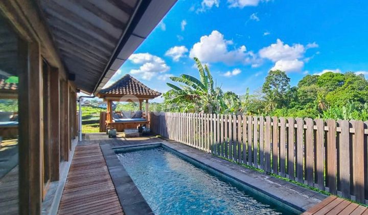 This is a good deal for a 2-bedroom villa with a 16-year lease. @Nyanyi - A short drive from Canggu.