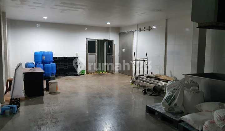 For sale: 2-story warehouse Safe N Lock, former chocolate sprinkles factory.