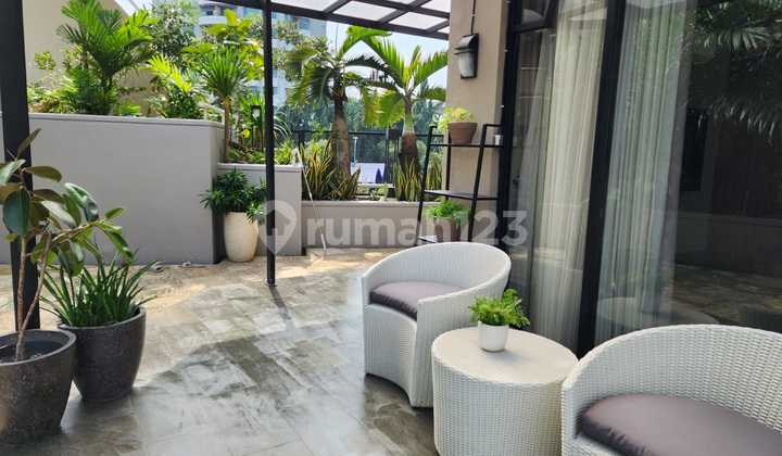 Beautiful 3+1 Br Apartment with European Classic Interior Fully Renovated at Beverly Tower Simatupang Featuring a Garden and BBQ Area 2