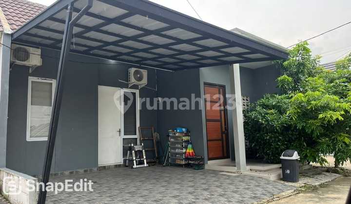 Rumah siap huni di Mutiara Gading City Cluster New Liverpool , Bekasi