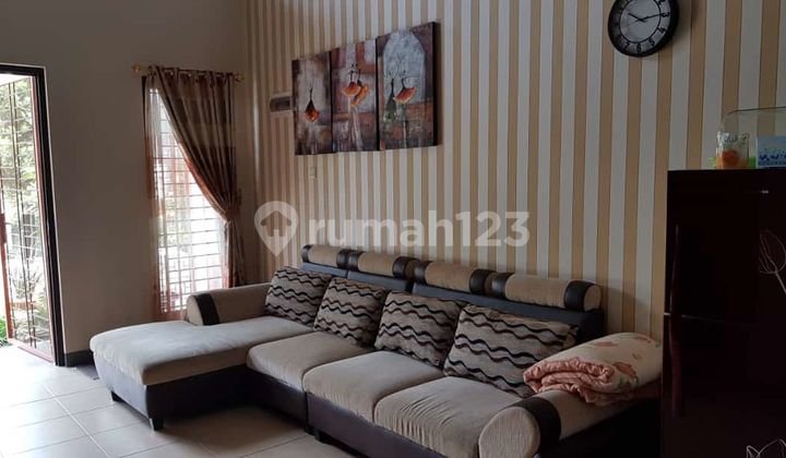 House in Harapan Mulya Housing, Acasia Cluster, Bekasi. 2