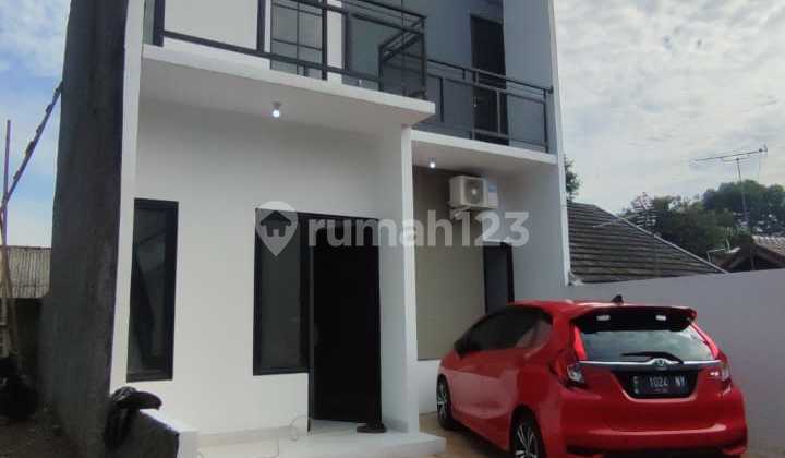 Over Credit 2-Storey House Location on the Edge of Kalimulya Road, Cilodong, Near Depok Town Square 2