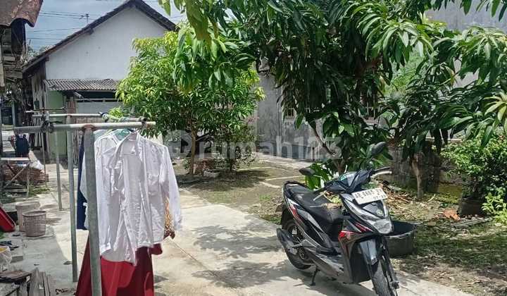 Jual Tanah Bonus Bangunan Ruko Letak Strategis Deoan Jalan Raya