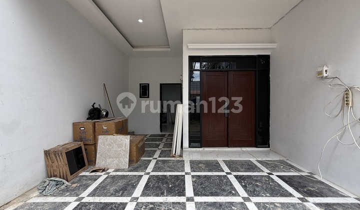 Ready-to-Occupy House with Full Red Bricks in Jagakarsa Near Brigif Toll Road 2