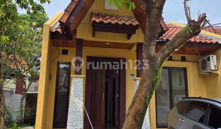 Dijual Rumah Mungil Dan Asri Dalam Cluster Yang Tenang Di Sawangan Depok.