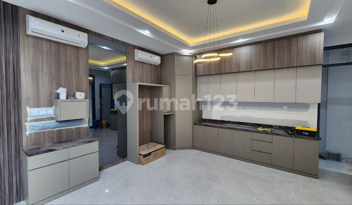 New Modern Minimalist 3-Storey House in Citraland Utama Surabaya 2