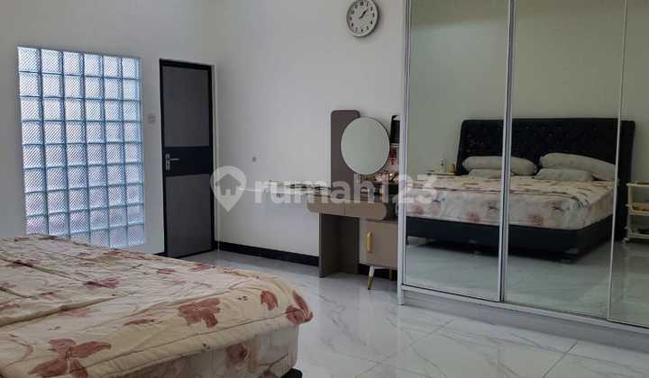dijual rumah gede di Puri Gardena full furnished 2