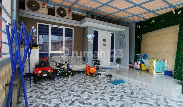 Over Home Credit near Toll 119JT in Graha Laras Sentul Bogor 2