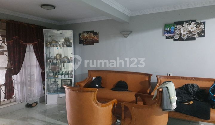 For Sale: House with Pouch-Shaped Land in Cipinang Melayu Area, Requires Minimal Renovation, SHM.