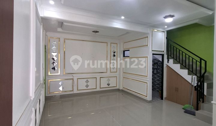 Rumah Nyaman Bagi Keluarga dengan 5 Kamar 2
