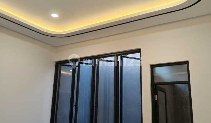 ‼️ *Hot Listing* **Exclusive New Modern House**
✅️ Strategic Location ✅️ Near Merr & 5 Minutes to Galaxy Mall ✅️ Closer Access to City Center ✅️ 8-Meter Road Frontage
- Premium Materials, Granite Tiles, Toto Sanitary, Solid Door Leaves, Aluminum Frames, Stainless Railings 2