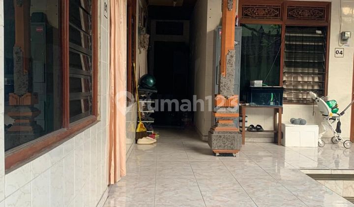 Translation: 'Boarding House for Sale Located in Pemogan'