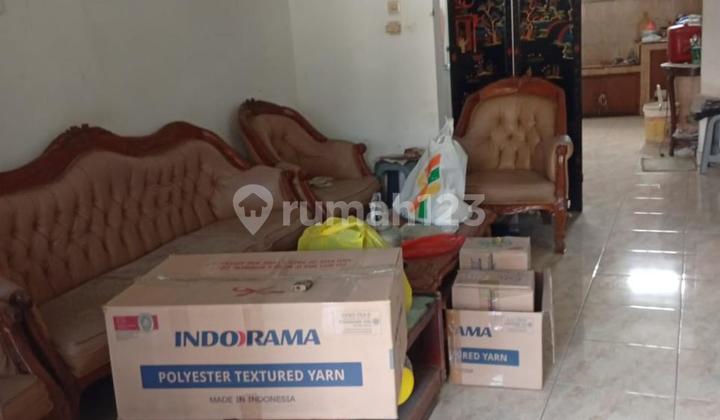 Affordable House Needs Renovation Strategic Area Spacious in Taman Kopo Indah 1