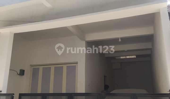 For Sale House with Bonus of Ready-to-Occupy and Clean Boarding Rooms in Gunungsari Area Surabaya, Near Merr, Close to Tambaksumur Toll Access and Move-in Ready 1