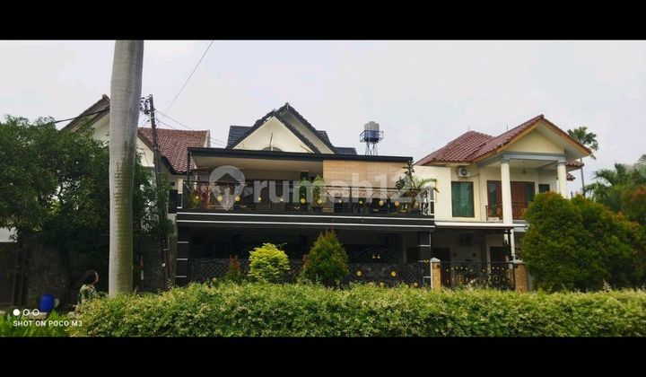 Rumah Modern Tropis Jalan Utama Metland Menteng