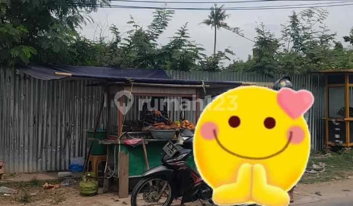 Land by the Roadside in a Busy Location