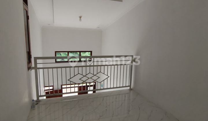 Minimalist 2-Story House with One Gate System in Pancoran Mas, Depok