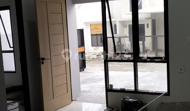 Rumah Minimalis Lebar Muka 6.8M Tanah Luas 103M² di Mekarjaya 2