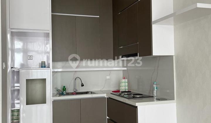 For Rent: Ciputra International Apartment, 3 Bedrooms, Semi-furnished, Puri Indah Ring Road.