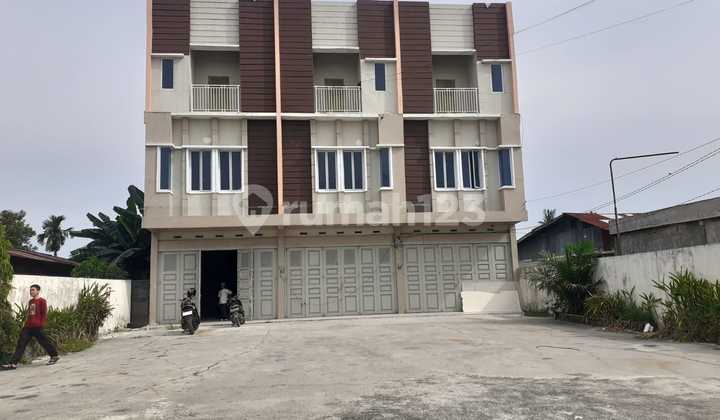 Three-Door Strategic Shophouse Row on Hr Soebrantas