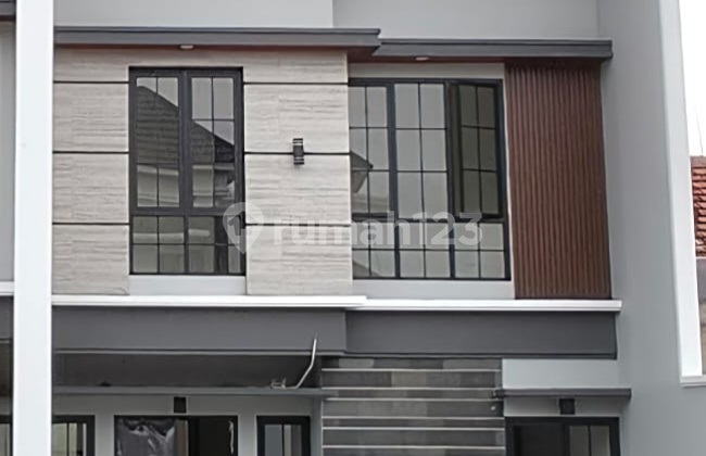 Rumah Baru Gress Bergaya Kontemporer Terletak di Araya 2 Surabaya