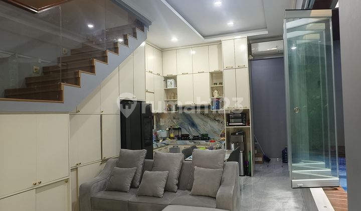 For Sale Beautiful 3-Story Cluster House with Private Swimming Pool in Harapan Indah Bekasi 2