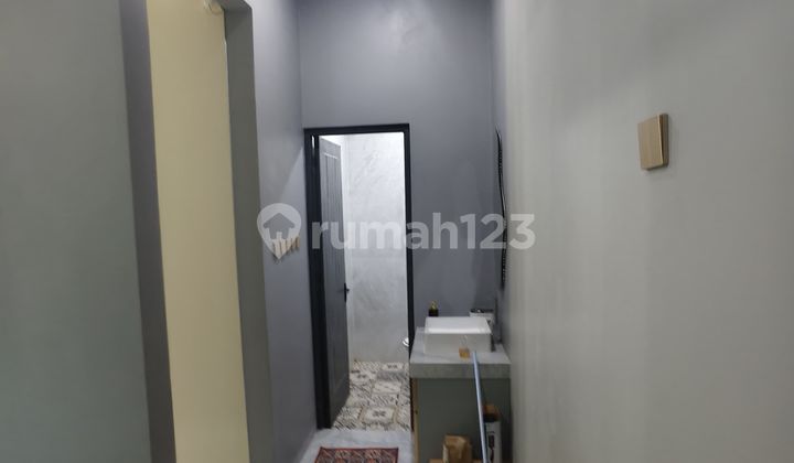 For Sale 3-Story House in a Cluster with Private Swimming Pool in Harapan Indah, Bekasi 2