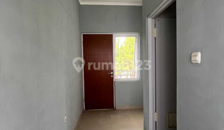 Minimalist House in Kolmas Cipageran Near AWC 2 Floors with Garden 2
