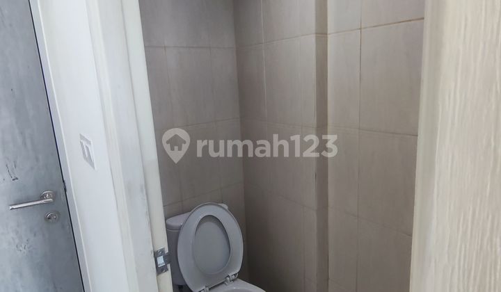 Jual Rugi Apartemen Osaka Riverview Tipe Studio