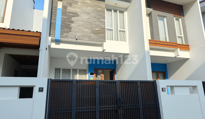 Modern Minimalist 2.5-Story House in Tomang - Ready to Occupy and Strategically Located