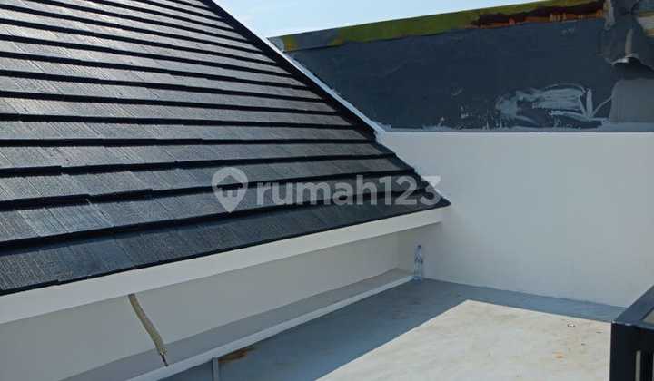 For Sale 1.5-Story House in Wiguna Housing, Surabaya 2