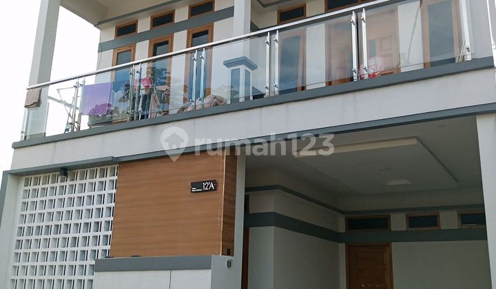 Rumah Lingkungan Sejuk Dekat Sekolah Internasional