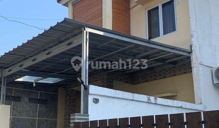 Luas Tanah 72 di Posisi Hook Konsep Bangunan Moderen