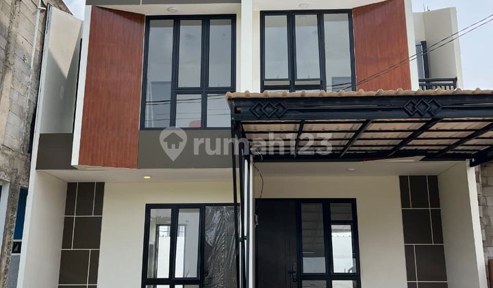 Rumah 2 Lantai Tanpa DP Lebar Jalan 2 Mobil SHM Rumah 2 Lantai Tanpa DP Lebar Jalan 2 Mobil SHM