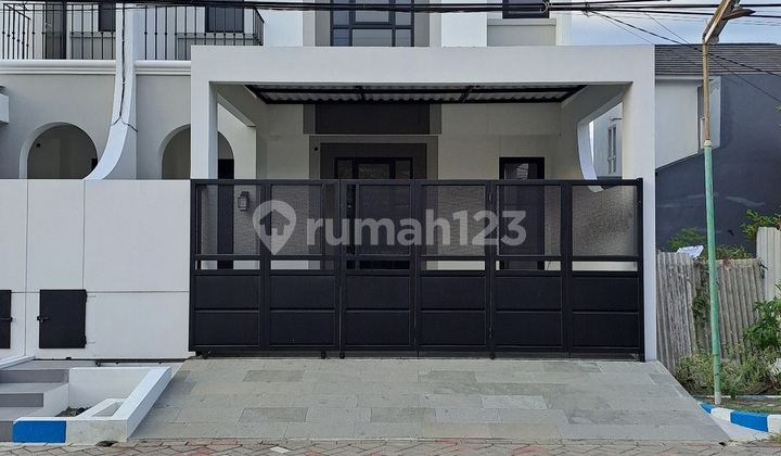 A026. Rumah Baru Gress Modern Pondok Tjandra 2