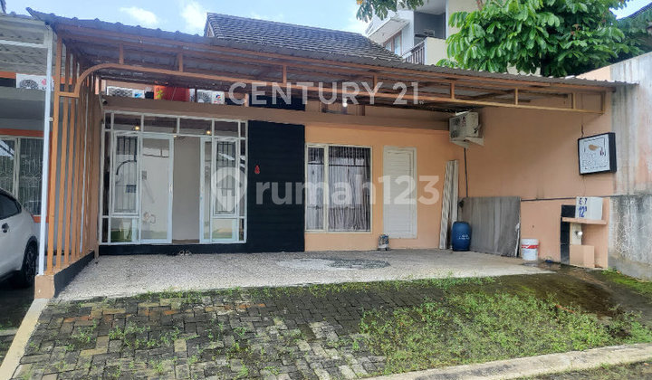 English Translation:

House for Sale as a Business Space in Graha Taman Pelangi.