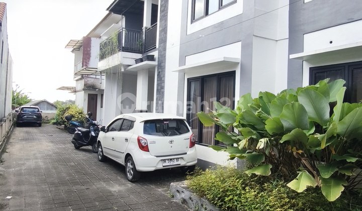 Minimalist House Gung Soputan 2 Car Garage 2
