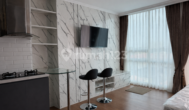 Minimalist Studio Apartment with City View Balcony 2