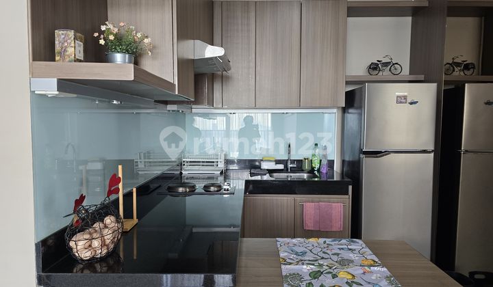 For Rent Ciputra Apartment, West Jakarta - 2 BR Hook Unit with City & Pool View 2