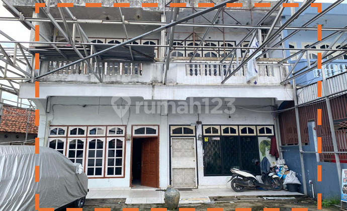 The house has a large land area and is located in the city center.