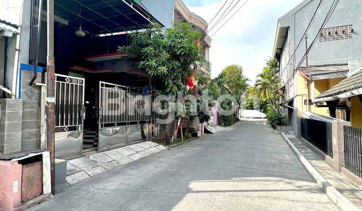 RUMAH DI KOMPLEK PERTAMINA TUGU JL MUTIARA 2